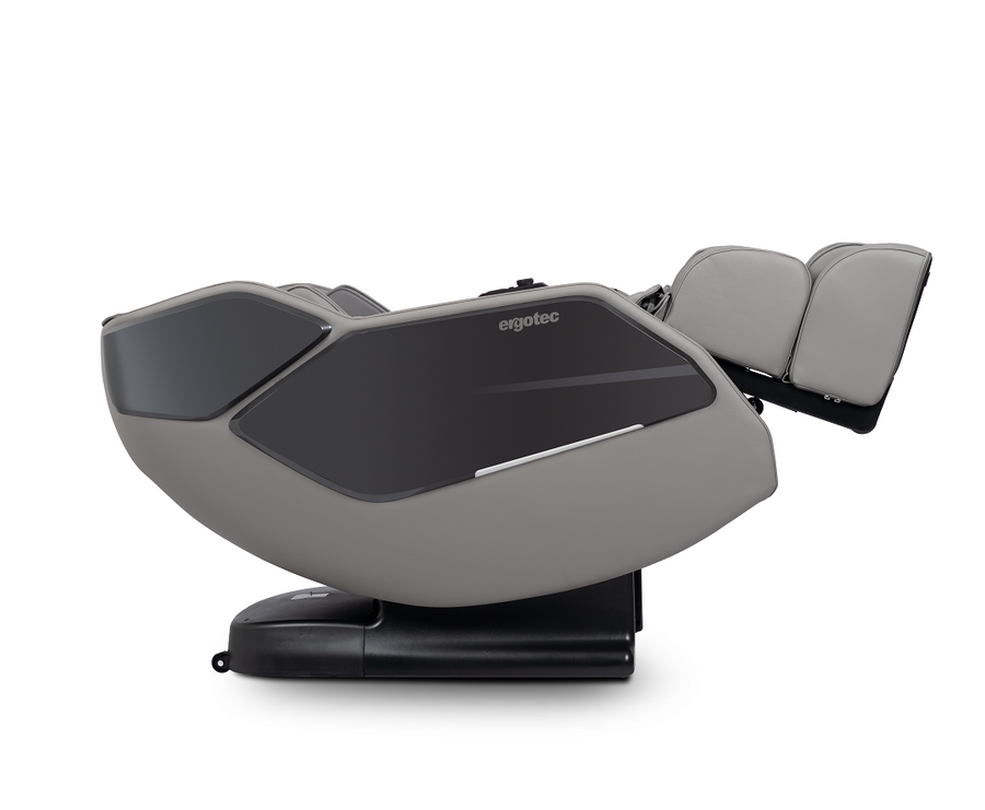 The ErgoTec ET-180 Pluto in gray and black is a modern 3D L-Track massage chair, fully reclined.